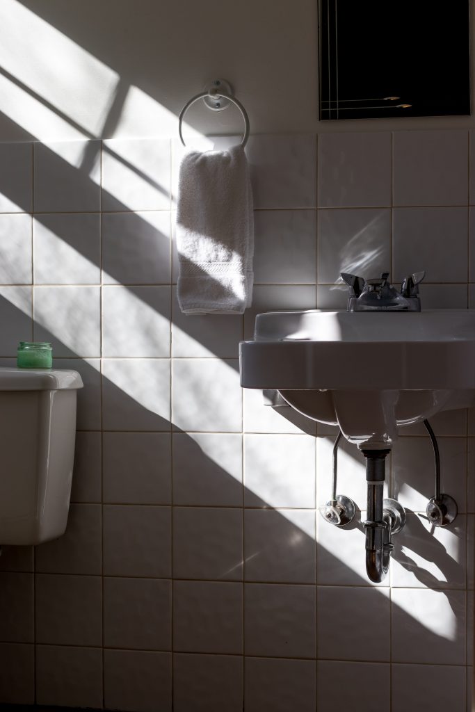 commercial plumber Brisbane - bathroom with sunlight streaming in