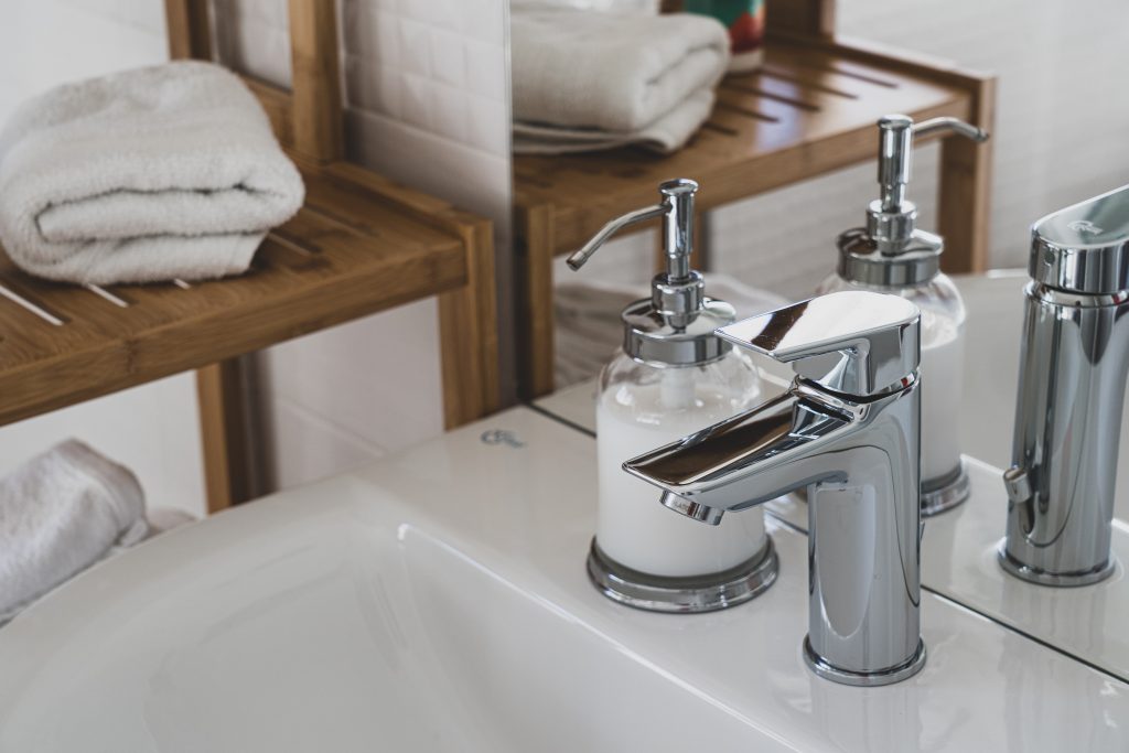 general plumber - modern bathroom with silver tap