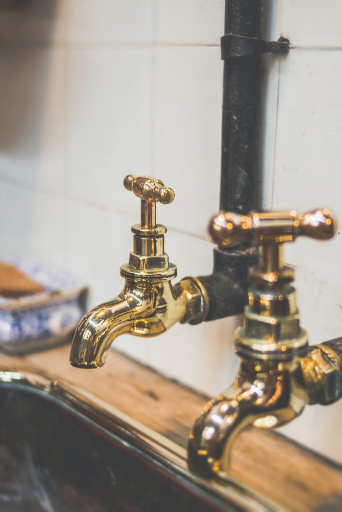 commercial plumber Sunshine Coast - two golden faucets